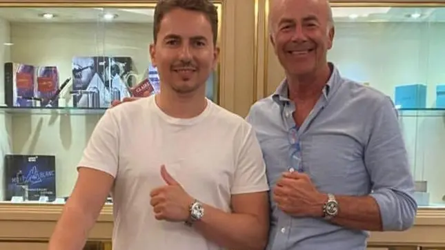 Sopra Jorge Lorenzo con Elvio Piva