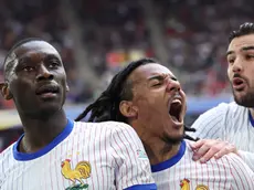 epa11450694 Randal Kolo Muani (L) of France celebrates scoring the opening goal during the UEFA EURO 2024 Round of 16 soccer match between France and Belgium, in Dusseldorf, Germany, 01 July 2024. EPA/GEORGI LICOVSKI