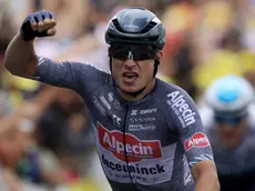 epaselect epa11474520 Belgian rider Jasper Philipsen of Alpecin - Deceuninck celebrates as he crosses the finish line to win the 13th stage of the 2024 Tour de France cycling race over 165km from Agen to Pau, France, 12 July 2024. EPA/GUILLAUME HORCAJUELO