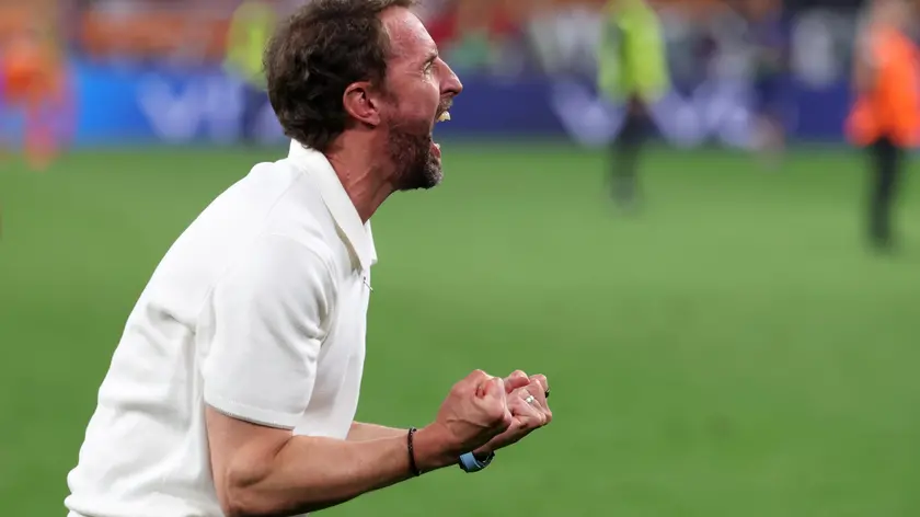 epa11471505 Head coach Gareth Southgate of England celebrates after winning the UEFA EURO 2024 semi-finals soccer match between the Netherlands and England, in Dortmund, Germany, 10 July 2024. EPA/CHRISTOPHER NEUNDORF