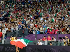 Gold medallist, Nadia Battocletti of Team Italy, celebrates as they cross the finish line to win in the Women's 10,000m Final during the European Athletics Championship at Olimpico Stadium in Rome, Italy, 11 June 2024. ANSA/FABIO FRUSTACI