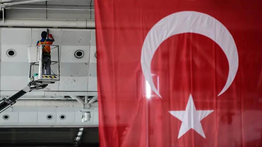 A worker wipes traces of blood from the wall of Ataturk Airport in Istanbul, Wednesday, June 29, 2016. Suicide attackers killed dozens and wounded more than 140 at Istanbul's busy Ataturk Airport late Tuesday, the latest in a series of bombings to strike Turkey in recent months. Turkish officials said the massacre was most likely the work of the Islamic State group. Turkish authorities have banned distribution of images relating to the Ataturk airport attack within Turkey.(AP Photo/Omer Kuscu) TURKEY OUT