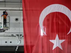 A worker wipes traces of blood from the wall of Ataturk Airport in Istanbul, Wednesday, June 29, 2016. Suicide attackers killed dozens and wounded more than 140 at Istanbul's busy Ataturk Airport late Tuesday, the latest in a series of bombings to strike Turkey in recent months. Turkish officials said the massacre was most likely the work of the Islamic State group. Turkish authorities have banned distribution of images relating to the Ataturk airport attack within Turkey.(AP Photo/Omer Kuscu) TURKEY OUT