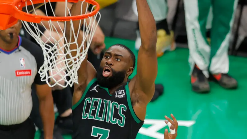 epa11364965 Boston Celtics guard Jaylen Brown (L) dunks the ball past Indiana Pacers center Myles Turner (R) during the first half of the NBA Eastern Conference Finals game two between the Boston Celtics and the Indiana Pacers, in Boston, Massachusetts, USA, 23 May 2024. Boston Celtics lead the best of seven series 1-0. EPA/CJ GUNTHER SHUTTERSTOCK OUT
