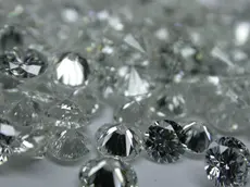 Photo shows the diamonds polished at a diamonds processing factory in Qingdao in east China's Shandong province on 31 July 2009. During the first half of 2009, China imported US$$$ 300 million (212 killion euro) worth of polished diamonds, an increase of 12.7 percent year-on-year. ANSA/STR