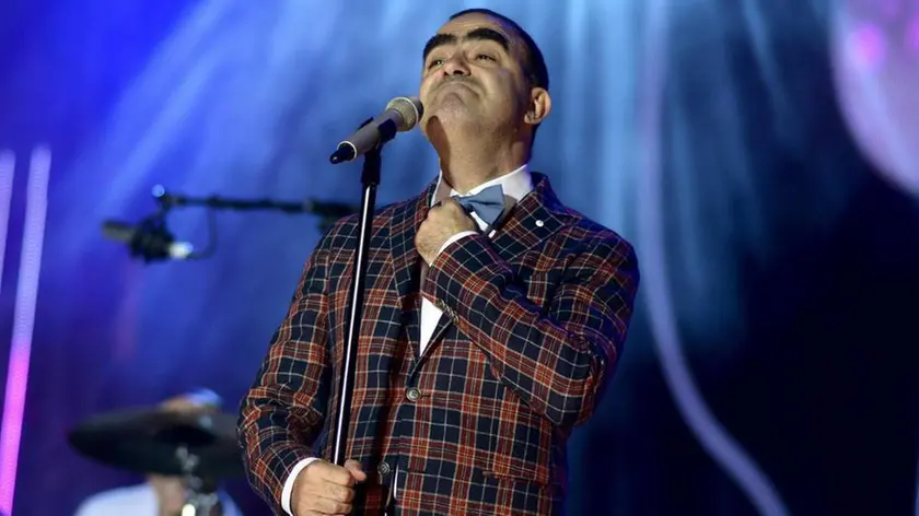 Elio e Le Storie Tese si esibiscono sul palco del concerto del 1 maggio 2013, in piazza San Giovanni a Roma. ANSA/ GUIDO MONTANI