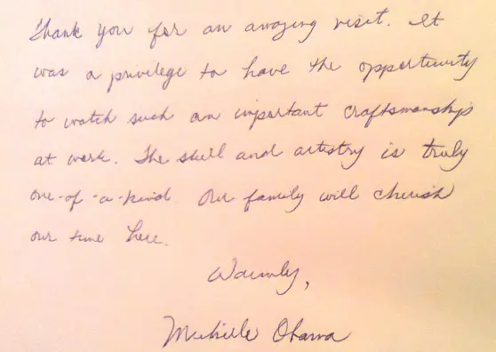 La dedica lasciata da Michelle Obama sul libro degli ospiti della fornace Cenedese (foto Ansa)