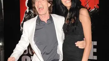 March 30 2008, New York City Musician Mick Jagger of the Rolling Stones and L'Wren Scott arriving at the premiere of the Rolling Stones movie 'Shine A Light' at the Ziegfeld Theater in midtown Manhattan