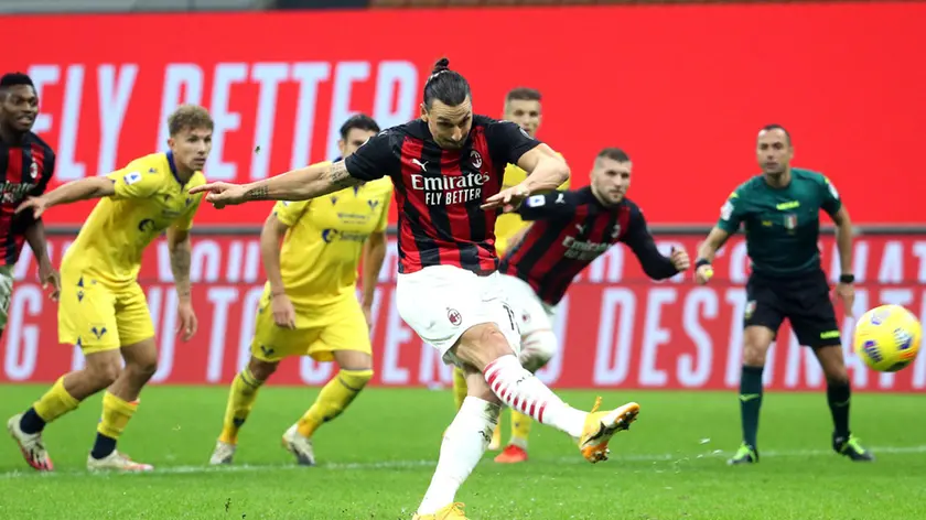AC MilanÃ?s Zlatan Ibrahimovic kicks out a penalty during the Italian serie A soccer match Ac Milan vs Hellas Verona at Giuseppe Meazza stadium in Milan 8 November 2020. ANSA / MATTEO BAZZI