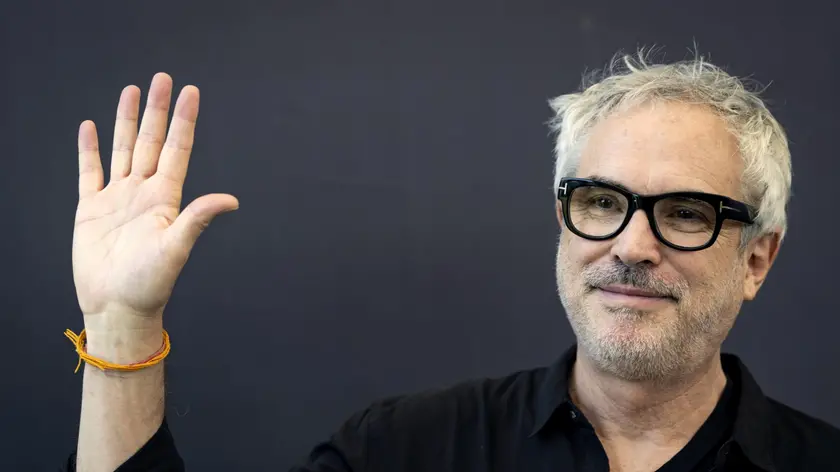 epa11545511 Mexican director Alfonso Cuaron poses during a photocall at the 77th Locarno International Film Festival, in Locarno, Switzerland, 11 August 2024. The festival runs from 07 to 17 August 2024. EPA/JEAN-CHRISTOPHE BOTT