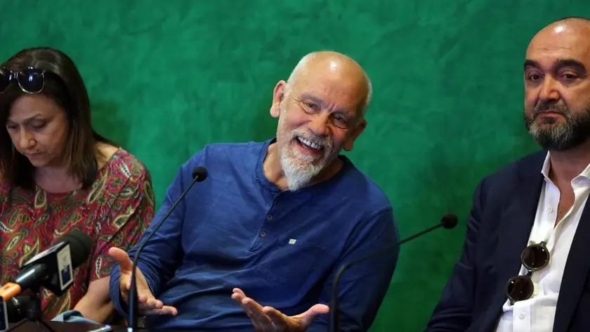 US actor, director, and producer, John Malkovich (C), addresses a spech at the Emilia Romagna Festival in the Business Lounge of Marconi airport in Bologna, Italy, 16 July 2017. ANSA/GIORGIO BENVENUTI