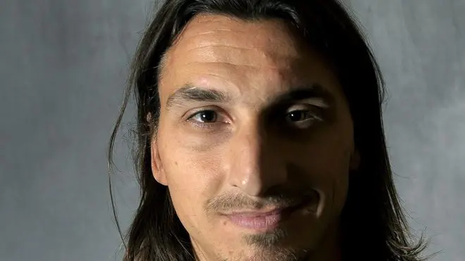 epa02997050 AC Milan soccer player Zlatan Ibrahimovic of Sweden poses with a copy of his autobiography, entitled Jag Aer Zlatan Ibrahimovic (I Am Zlatan Ibrahimovic) during a presser held to promote the book, in Stockholm, Sweden, 08 November 2011. EPA/JANERIK HENRIKSSON SWEDEN OUT