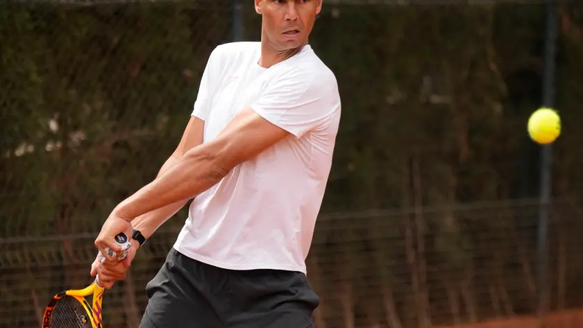 epa11279815 Spanish tennis player Rafael Nadal attends a training session at the Reial Club de Tennis Barcelona 1899 complex to prepare for his participation in the Barcelona Open tennis tournament in Barcelona, Spain, 15 April 2024. The Barcelona Open run from 15 to 21 April. EPA/Enric Fontcuberta