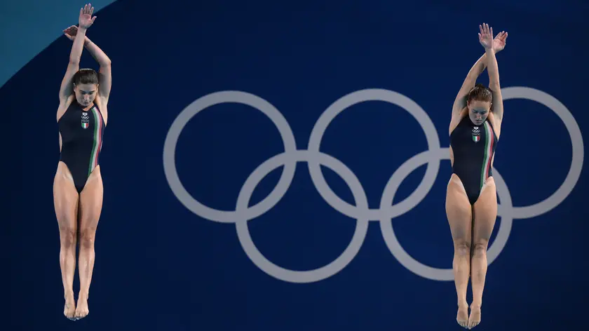 Italian Elena Bertocchi (L) and Chiara Pellacani compete in the Women's Synchronised 3M Springboard Final of the Diving competition during the Paris 2024 Olympic Games at the Aquatics Centre in Paris, France, 27 July 2024. Summer Olympic Games will be held in Paris from 26 July to 11 August 2024. ANSA/ETTORE FERRARI