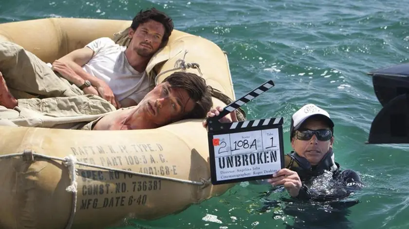 An undated handout image released by Universal Pictures on 01 November 2013, shows actors performing in the ocean during the filming of the new film 'Unbroken' directed by US actress and director Angelina Jolie, in Moreton Bay Australia. The drama follows the life of Italian-US Olympian and war hero Louis Zamperini. ANSA/UNIVERSAL AUSTRALIA AND NEW ZEALAND OUT HANDOUT EDITORIAL USE ONLY/NO SALES