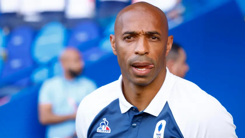 epa11540233 Head coach Thierry Henry of France reacts ahead of the Gold medal match between France and Spain, of the Soccer competitions in the Paris 2024 Olympic Games, at the Parc des Princes stadium in Paris, France, 09 August 2024. EPA/MOHAMMED BADRA