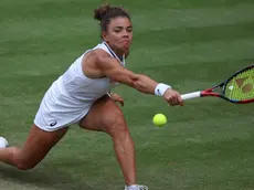 epa11472277 Jasmine Paolini of Italy in action against Donna Vekic of Croatia during their Women's Singles semi final match at the Wimbledon Championships, Wimbledon, Britain, 11 July 2024. EPA/ADAM VAUGHAN EDITORIAL USE ONLY