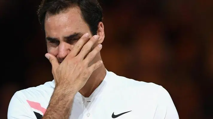 epa06481294 Winner Roger Federer of Switzerland holds his trophy during the awarding ceremony of the Men's final match at the Australian Open Grand Slam tennis tournament in Melbourne, Australia, 28 January 2018. EPA/LUKAS COCH AUSTRALIA AND NEW ZEALAND OUT