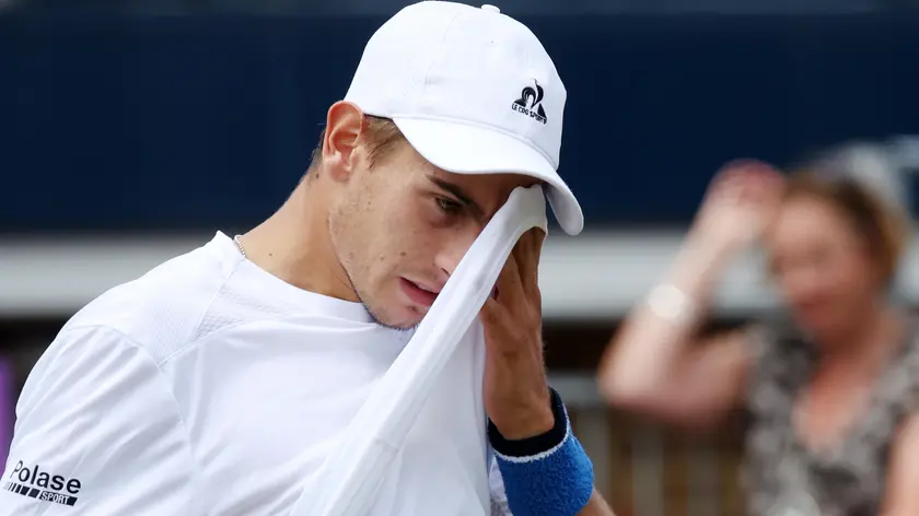 epa11422280 Matteo Arnaldi of Italy during his round match against Rinky Hijikata of Australia at the Cinch ATP tennis tournament at Queen's Club in London, Britain, 19 June 2024. EPA/ANDY RAIN