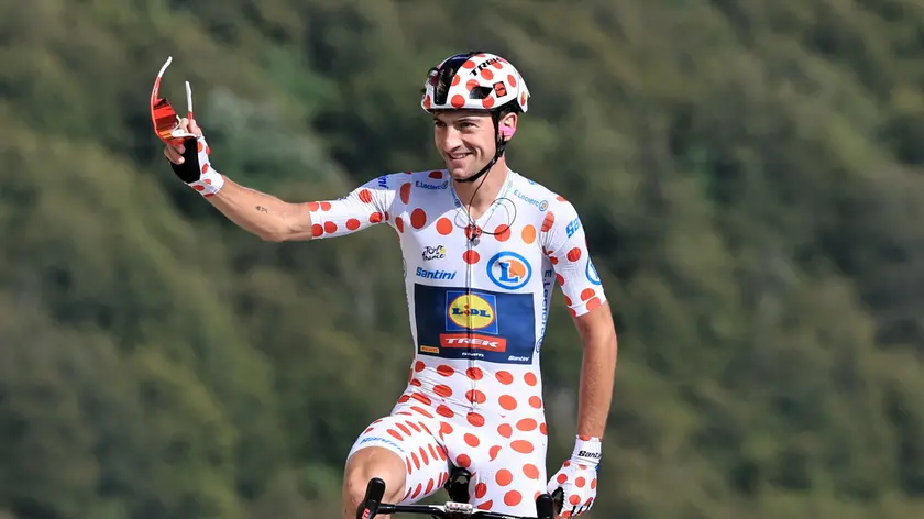 epa10762415 Polka Dot Jersey best climber Italian rider Giulio Ciccone of team Lidl-Trek reacts as he crosses the finish line of the 20th stage of the Tour de France 2023, a 134kms from Belfort to Le Markstein Fellering, France, 22 July 2023. EPA/CHRISTOPHE PETIT TESSON