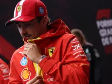 epa11363967 Scuderia Ferrari driver Charles Leclerc of Monaco walks in the paddock of the Circuit de Monaco in Monte Carlo, Monaco, 23 May 2024. The 2024 Formula 1 Grand Prix of Monaco is held on the Circuit de Monaco racetrack on 26 May 2024. EPA/ANNA SZILAGYI