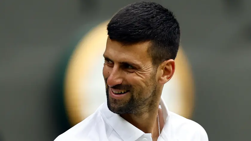 epa11474941 Novak Djokovic of Serbia reacts during the Men's semifinal match against Lorenzo Musetti of Italy at the Wimbledon Championships, Wimbledon, Britain, 12 July 2024. EPA/TOLGA AKMEN EDITORIAL USE ONLY