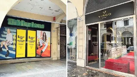 In alto a sinistra il negozio in apertura di “Dr Martens” e a destra “Virgo” in via Emanuele Filiberto