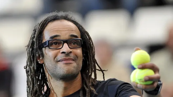 epa01635440 French former tennis star and singer Yannick Noah at the 'Fete Le Mur' association exhibition during the semi finals match of the Gaz de France WTA Open 2009 tournament in Paris, France, 14 February 2009. This association, presided by Noah, enables young people in disadvantaged neighbourhoods to play tennis, allowing the keenest among them to join clubs that are affiliated members of the French Tennis Federation. EPA/HORACIO VILLALOBOS