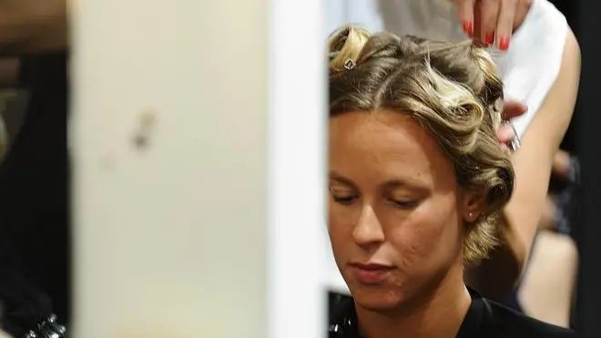 Federica Pellegrini nel backstage della sfilata di Raffaella D'Angelo durante la Settimana della Moda di Milano, 21 settembre 2013. Italian swimmer Federica Pellegrini on the backstage of presentation of collection Spring Summer 2014 by Italian designer Raffaella D'Angelo (not pictured) during Milan Fashion Week Woman in Milan, Italy, 21 September 2013. Milan Fashion Week Woman runs from 18 to 23 September 2013. ANSA/ FLAVIO LO SCALZO