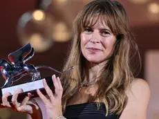 Italian filmmaker Maura Delpero holds the Silver Lion - Grand Jury Prize for his movie Vermiglio during the closing ceremony of the 81st annual Venice International Film Festival, in Venice, Italy, 07 September 2024. The 81st edition of the festival runs from 28 August to 07 September 2024. ANSA/ETTORE FERRARI