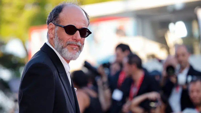 Italian director Luca Guadagnino arrives for the premiere of ‘Queer’ at the 81st annual Venice International Film Festival, in Venice, Italy, 03 September 2024. The movie is presented in the official competition 'Venezia 81' at the festival running from 28 August to 07 September 2024. ANSA/FABIO FRUSTACI