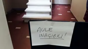 SOTT’ACQUA. L’interno del conservatorio Pollini, in via Cassan, inagibile dopo il nubifragio di giovedì pomeriggio; a sinistra, via Porciglia allagata