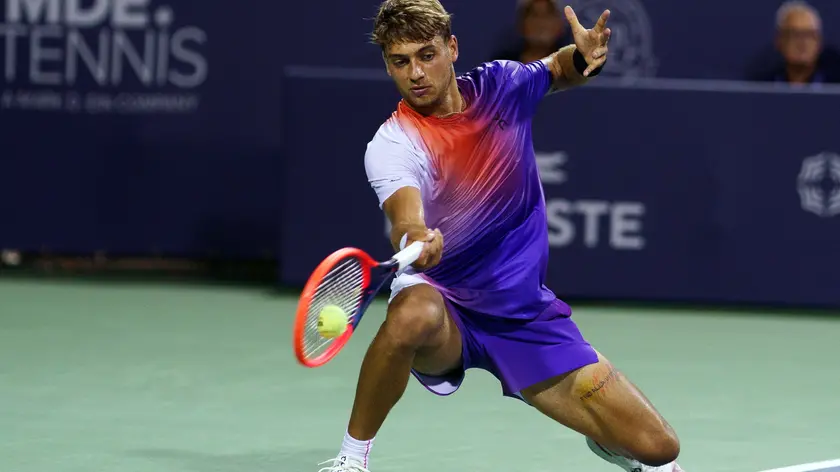 epa11526539 Flavio Cobolli of Italy in action against Sebastian Korda of the US during the Mens final of the Mubadala Citi DC Open, in Washington, DC, USA, 04 August 2024. EPA/WILL OLIVER