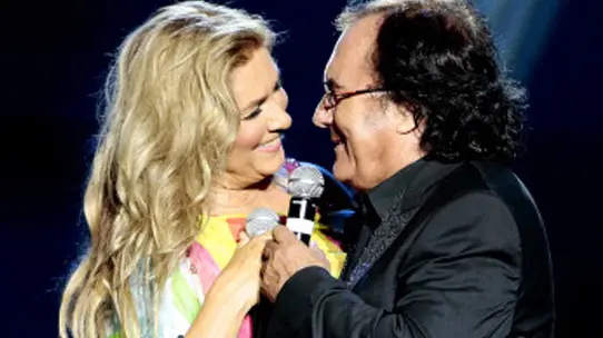 GIRONA, SPAIN - AUGUST 05: (L-R) Romina Power and Al Bano Carrisi perform on stage their last show 'AL BANO in concert- special guest ROMINA POWER' during the Festival Castell Peralada on August 5, 2014 in Peralada, Girona, Spain. (Photo by Miquel Benitez/Getty Images)
