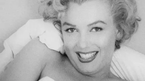 A handout picture provided by Julien's Auctions in Beverly Hills, California, USA, on 29 March 2012 shows a photograph of US actress Marylin Monroe by Romanian-born photographer Andre de Dienes in 1955. ANSA/ANDRE DE DIENES / JULIEN'S AUCTIONS / HANDOUT HANDOUT EDITORIAL USE ONLY/NO SALES