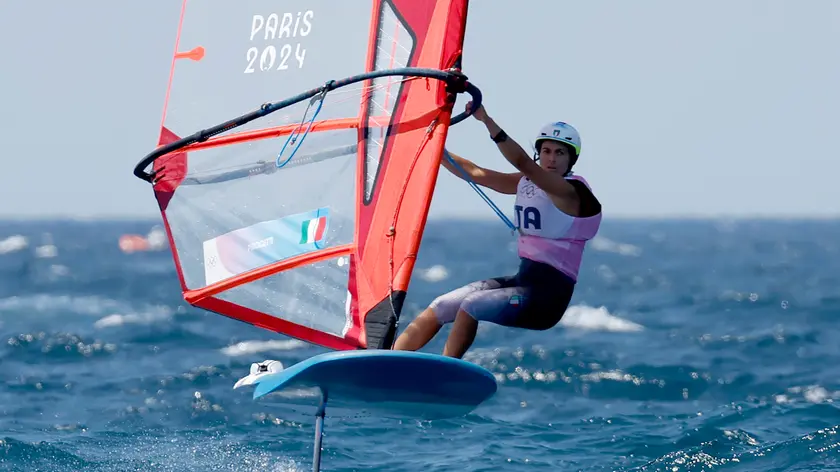 epa11521611 Marta Maggetti of Italy competes in the Women Windsurfing semifinals of the Sailing competitions in the Paris 2024 Olympic Games, at the Marseille Marina in Marseille, France, 03 August 2024. EPA/SEBASTIEN NOGIER