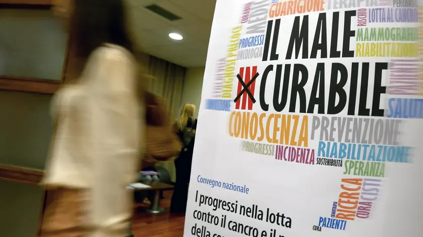 La locandina del convegno organizzato per la presentazione al ministero della Salute del libro 'Il male (in)curabile. I progressi nella lotta contro il cancro e il nuovo ruolo della comunicazione', Roma, 24 luglio 2014. ANSA/FABIO CAMPANA