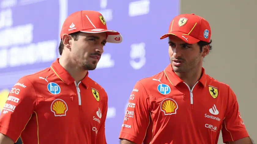 epa11761647 Scuderia Ferrari's drivers Carlos Sainz Jr. (R) of Spain and Charles Leclerc of Monaco arrive at the third practice session of the Formula One Abu Dhabi Grand Prix, in Abu Dhabi, United Arab Emirates, 07 December 2024. The 2024 Formula One Abu Dhabi Grand Prix is held on the Yas Marina Circuit racetrack on 08 December. EPA/ALI HAIDER