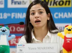 epa07741348 Syrian swimmer Yusra Mardini, who represents a refugee team, speaks during a news conference at the Main Press Center of the FINA World Championships at Nambu University Municipal Aquatics Center in Gwangju, South Korea, 26 July 2019. EPA/YONHAP SOUTH KOREA OUT