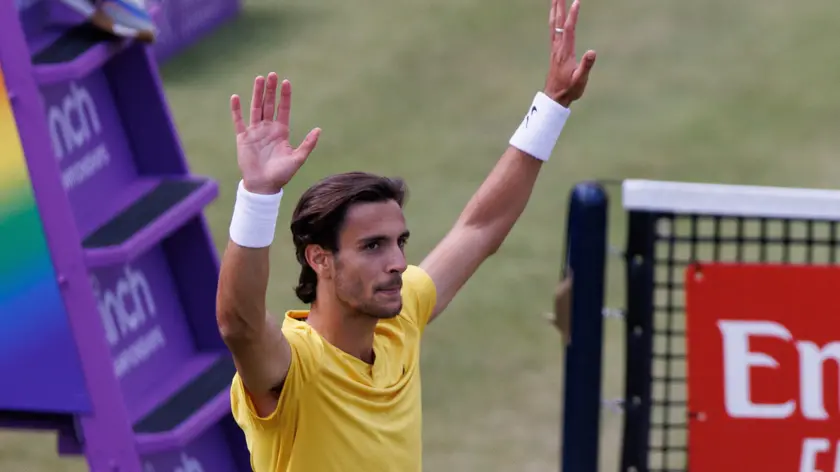 epa11428764 Lorenzo Musetti of Italy reacts to winning his quarter final match against Billy Harris of Britain at the Queen's Club tennis tournament in London, Britain, 21 June 2024. EPA/TOLGA AKMEN