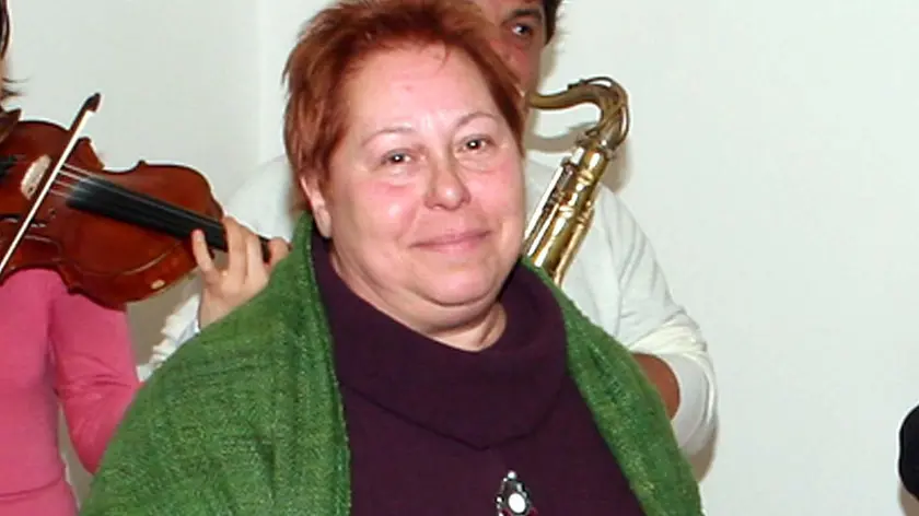 Padova 03 febbraio 2006 G.M...Via Zara 23:inaugurazione casa famiglia "NOI Associazione onlus"..Tina Ciccarelli con il gruppo musicale..(CARRAI) Via Zara 23:inaugurazione casa famiglia _NOI Associazione onlus_ di Tina Ciccarelli (CARRAI)