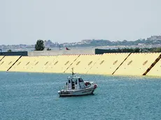 A view of the progressive raising of the last mobile gates of the Mose system from the lagoon in Venice, Italy, 10 July 2020, during a test of the system with the presence of Italian Prime Minister Giuseppe Conte. Media reports state that for the first time, only for a few hours, the Venice Lagoon has been completely closed to the sea for the first full test (with complete ban on maritime traffic) of the Mose's 78 mobile dams. The Mose system is intended to protect the city of Venice and the Venetian Lagoon from flooding. ANSA/ANDREA MEROLA