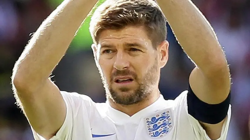 epa04325288 (FILES) A file picture dated 24 June 2014 of England's Steven Gerrard after the FIFA World Cup 2014 group D preliminary round match between Costa Rica and England at the Estadio Mineirao in Belo Horizonte, Brazil. England captain Steve Gerrard announced 21 July 2014 his retirement from international football. Gerrard, 34, earned 114 caps after making his debut 14 years ago. His last appearance came against Costa Rica at the World Cup last month as England were eliminated from the group stage. (RESTRICTIONS APPLY: Editorial Use Only, not used in association with any commercial entity - Images must not be used in any form of alert service or push service of any kind including via mobile alert services, downloads to mobile devices or MMS messaging - Images must appear as still images and must not emulate match action video footage - No alteration is made to, and no text or image is superimposed over, any published image which: (a) intentionally obscures or removes a sponsor identification image; or (b) adds or overlays the commercial identification of any third party which is not officially associated with the FIFA World Cup) EPA/DENNIS SABANGAN EDITORIAL USE ONLY