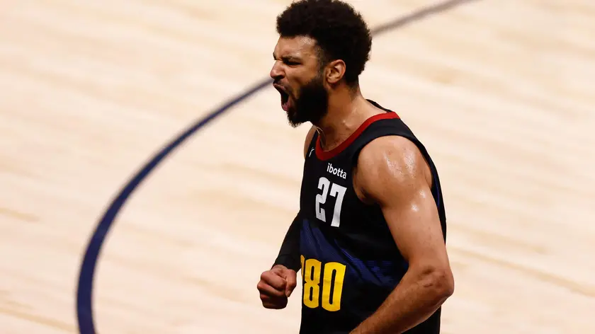 epa11354517 Denver Nuggets guard Jamal Murray celebrates after scoring during the second quarter of game seven of the Western Conference semifinal series between the Minnesota Timberwolves and the Denver Nuggets at Ball Arena in Denver,Colorado, USA, 19 May 2024. EPA/JUSTIN EDMONDS SHUTTERSTOCK OUT