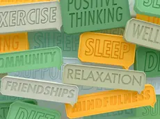Close up of lots of positive healthy lifestyle speech bubbles