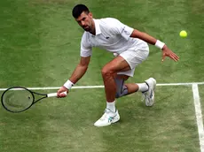 epa11474924 Novak Djokovic of Serbia in action during the Men's semifinal match against Lorenzo Musetti of Italy at the Wimbledon Championships, Wimbledon, Britain, 12 July 2024. EPA/ADAM VAUGHAN EDITORIAL USE ONLY
