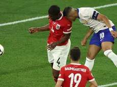 epa11418956 Kylian Mbappe of France (R) in action which led to his injury during the UEFA EURO 2024 group D soccer match between Austria and France, in Dusseldorf, Germany, 17 June 2024. EPA/GEORGI LICOVSKI