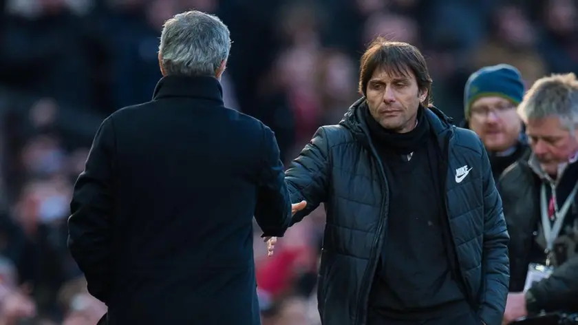 epa06564745 Chelsea manager Antonio Conte (R) and Manchester United manager Jose Mourinho (L) shake hands after the English Premier League soccer match between Manchester United and Chelsea FC held at Old Trafford, Manchester, Britain, 25 February 2018. EPA/PETER POWELL EDITORIAL USE ONLY. No use with unauthorized audio, video, data, fixture lists, club/league logos or 'live' services. Online in-match use limited to 75 images, no video emulation. No use in betting, games or single club/league/player publications.