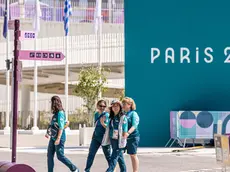 epa11485505 Paris staff members walk at the Athletes' Village of the Paris 2024 Olympic Games in Saint Denis, France, 18 July 2024. The Summer Olympics are scheduled to take place from 26 July to 11 August 2024 in Paris. EPA/CHRISTOPHE PETIT TESSON
