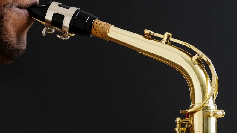Close up of man playing saxophone